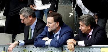 Gallardn, junto a Rajoy viendo un partido de tenis. | Archivo.