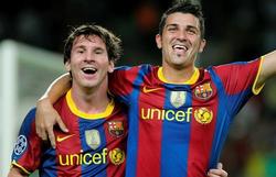 Messi y Villa celebran uno de los goles. | EFE
