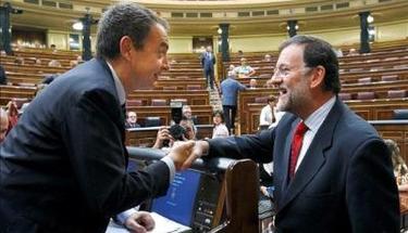 Zapatero y Rajoy, sonrientes, en el Congreso. | Archivo. 
